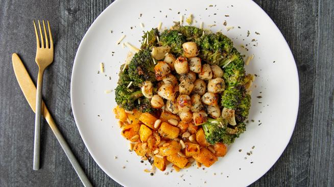 Natural Grocers Brown Butter Glazed Scallops Served with Roasted Broccoli and Butternut Squash Bites